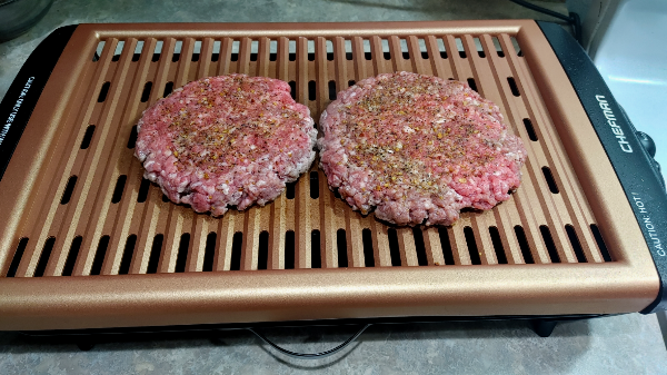 Grilled Burgers with seasoning and Sea Salt