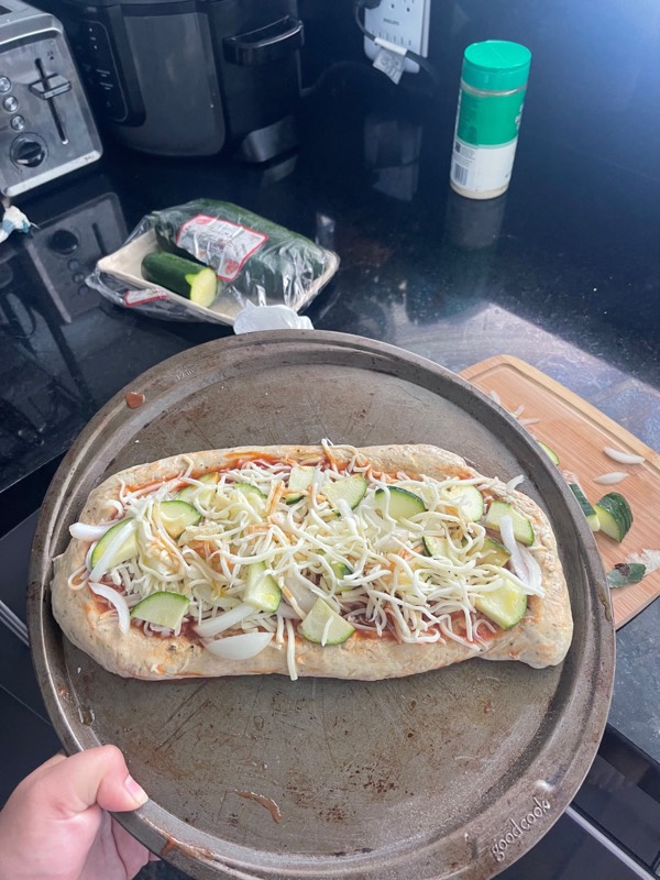 I tried making my own pizza 6/10