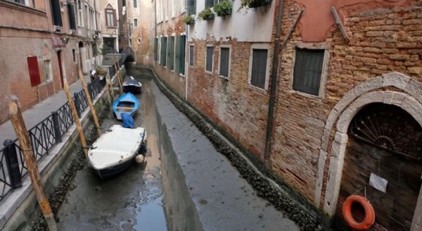 Venice waterways and canals go dry.