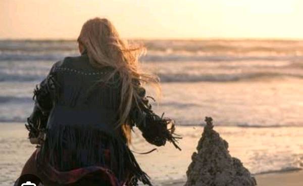 #StoryStarter | She sat alone on the sea shore in the fading light of dusk...