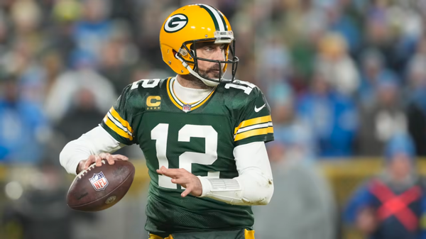 Rodgers injured in Jets debut.